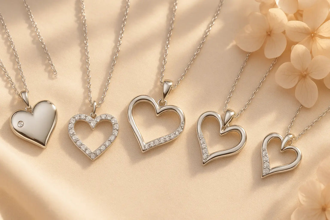 Elegant sterling silver heart jewelry collection featuring diamond heart pendants and necklaces on romantic background