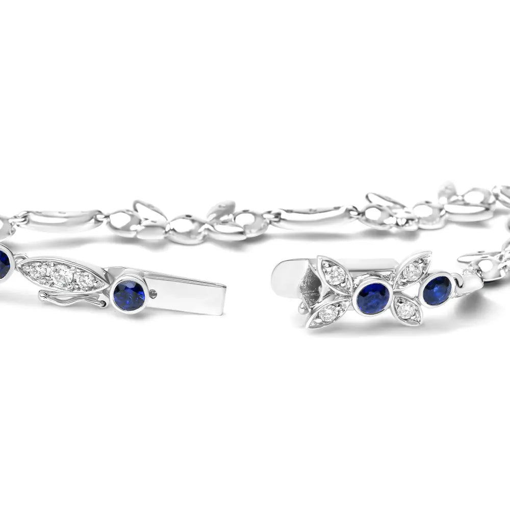 18K White Gold 1 3/4 Cttw Diamond and 3x3mm Round Blue Sapphire Gemstone Floral Link Bracelet (G-H Color, SI1-SI2 Clarity) - Size 7" - Bijoux-NYC Direct