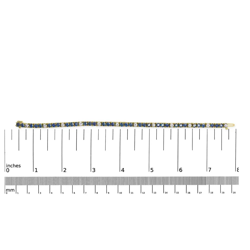 18k yellow gold alternating 1 1/5 cttw diamond and 3x3 mm blue sapphire tennis bracelet (g h color vs1 vs2 clarity) 7’’ inches