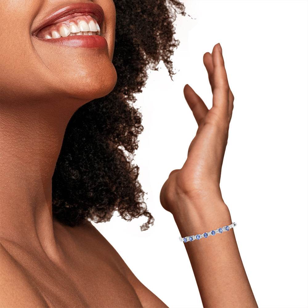 14K White Gold 5 MM Oval Blue Tanzanite and 1/4 Cttw Diamond Bangle (H-I Color, VS2-SI1 Clarity) - Fits wrists up to 7 1/2 Inches - Bijoux-NYC Direct