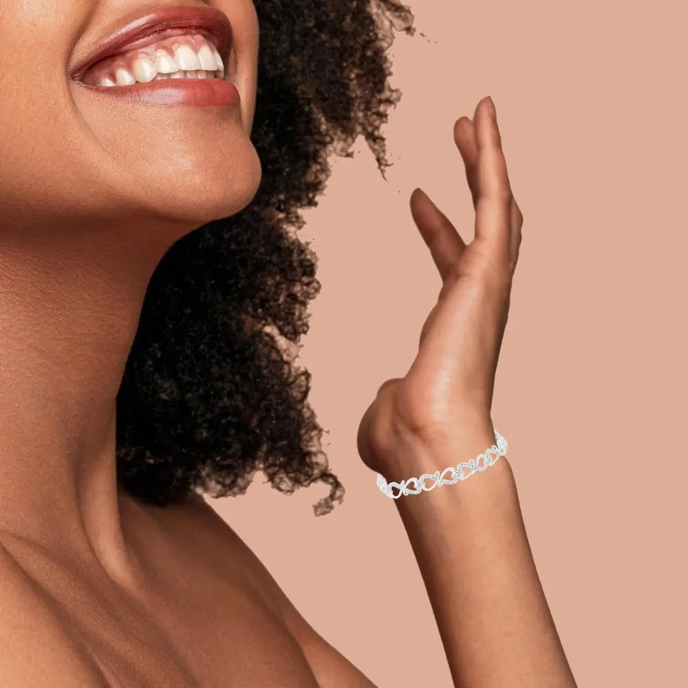 .925 Sterling Silver 1/3 Cttw Round-Cut Diamond Double Heart Infinity Link 7.25" Bracelet (H-I Color, I3 Clarity) - Bijoux-NYC Direct