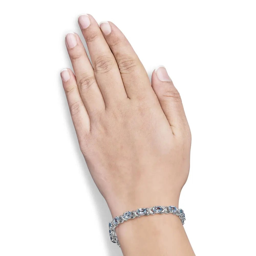 .925 sterling silver 16.0 cttw oval blue topaz and diamond accent tennis x link bracelet (i j color i1 i2 clarity) size 7’’ inch