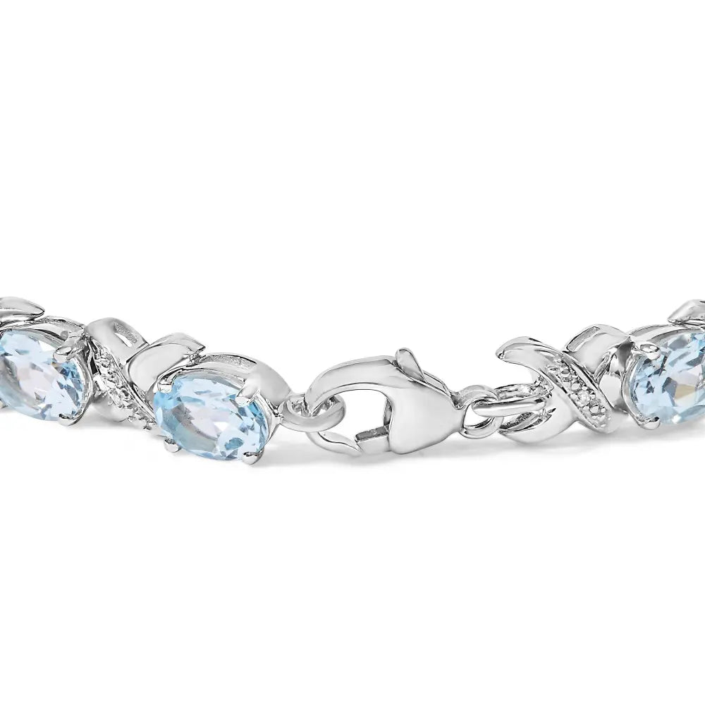 .925 sterling silver 16.0 cttw oval blue topaz and diamond accent tennis x link bracelet (i j color i1 i2 clarity) size 7’’ inch