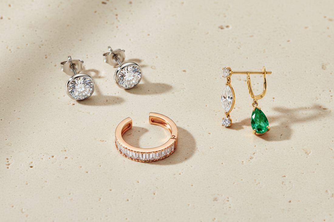 Diamond stud, hinged hoop, and leverback drop earrings arranged to compare fine-jewelry settings, metals, sizes, and closures.