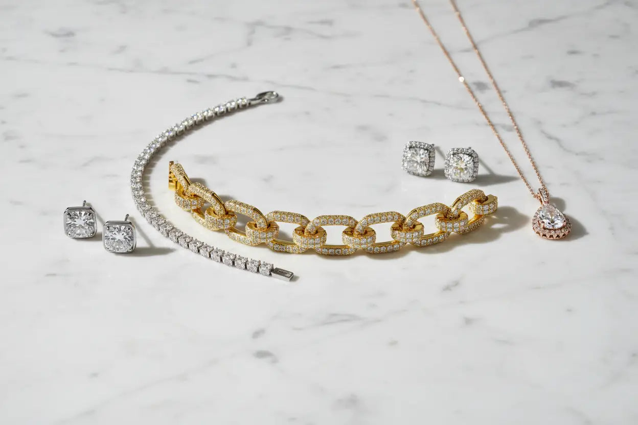 Diamond pavé bracelet, tennis bracelet, solitaire stud earrings, and diamond pendant necklace across yellow gold, white gold, and platinum — diamond fine jewelry collection at Bijoux NYC Direct