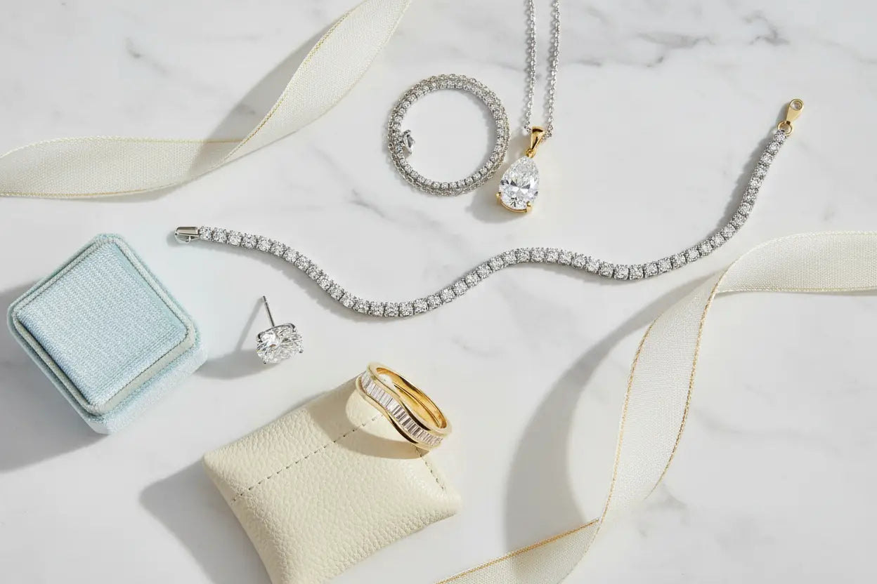 Fine jewelry gifts from $1,500 to $5,000d diamond tennis bracelet, solitaire studs, baguette wave band ring & teardrop pendant in 10K–14K gold – Bijoux NYC Direct