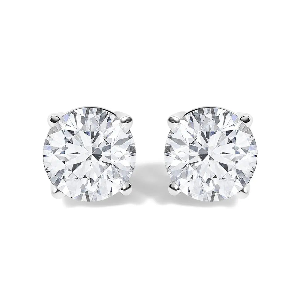 1.10 carat round diamond solitaire stud earrings in 14k white gold bijoux-nyc direct