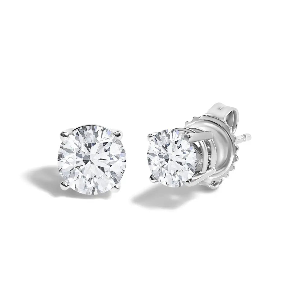 1.10 carat round diamond solitaire stud earrings in 14k white gold bijoux-nyc direct