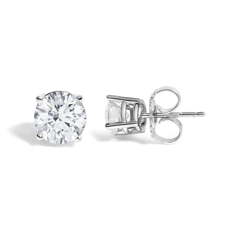 1.10 carat round diamond solitaire stud earrings in 14k white gold bijoux-nyc direct