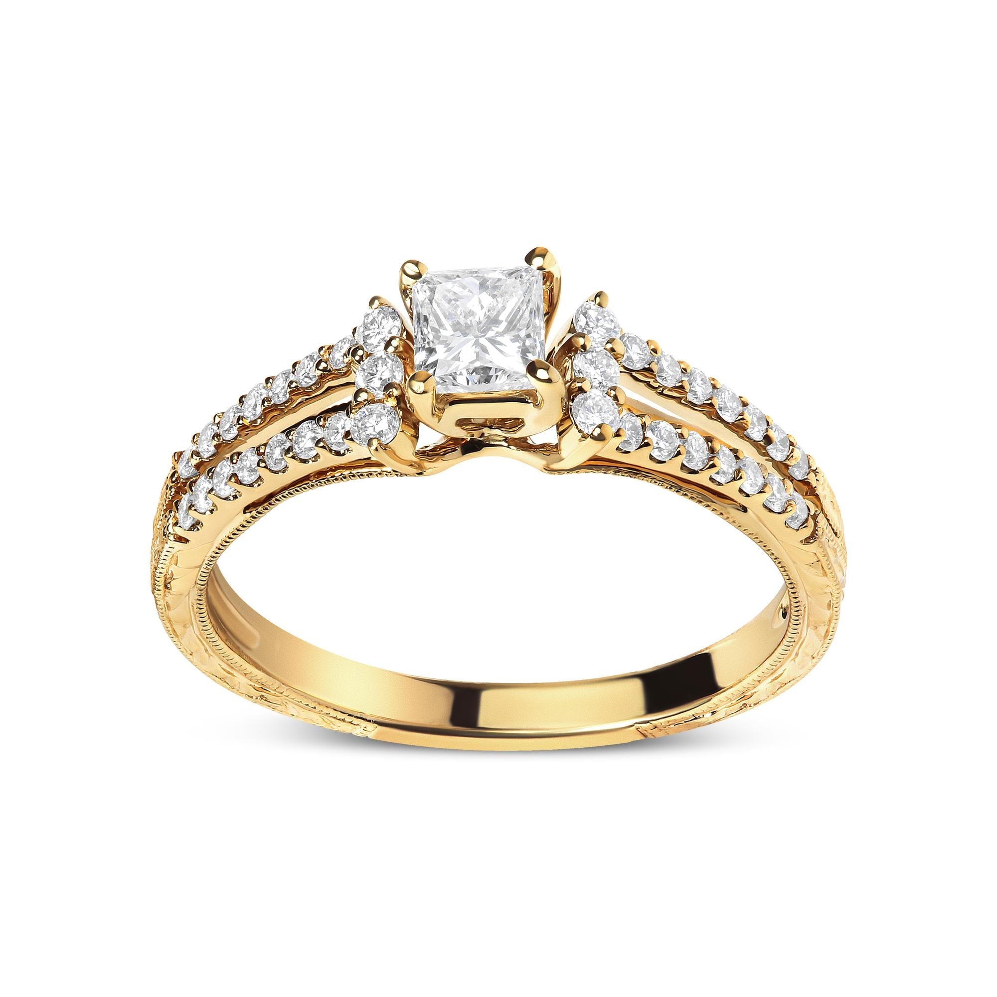 Gold engagement ring with a diamond on a white background
