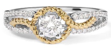 Two-tone diamond ring with gold and silver band on a white background