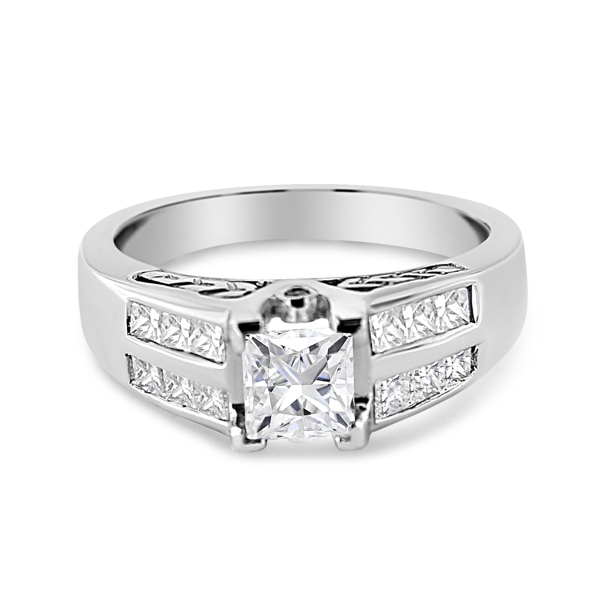 Silver ring with a central diamond and smaller diamonds on a white background
