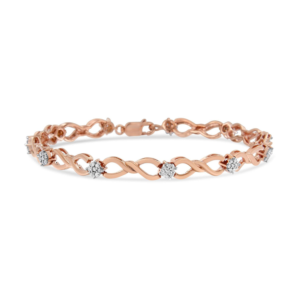Rose gold bracelet with diamond accents on a white background