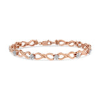 Rose gold bracelet with diamond accents on a white background