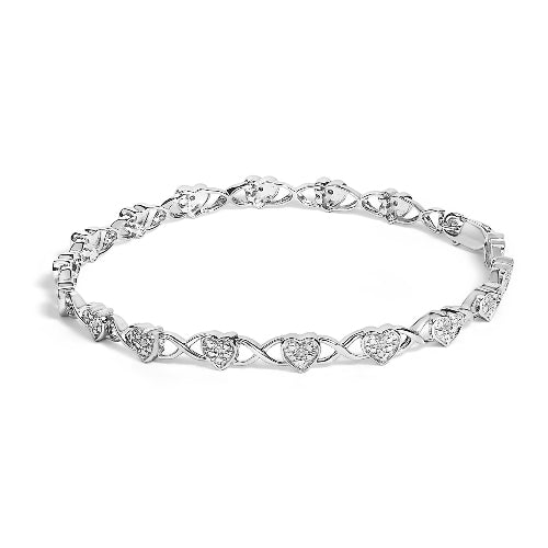Silver bracelet with heart designs on a white background