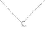 Silver necklace with a crescent moon pendant on a white background