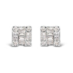 Pair of diamond stud earrings on a white background
