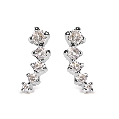 Pair of diamond earrings on a white background