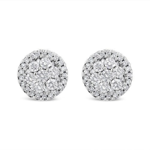 Pair of round diamond earrings on a white background