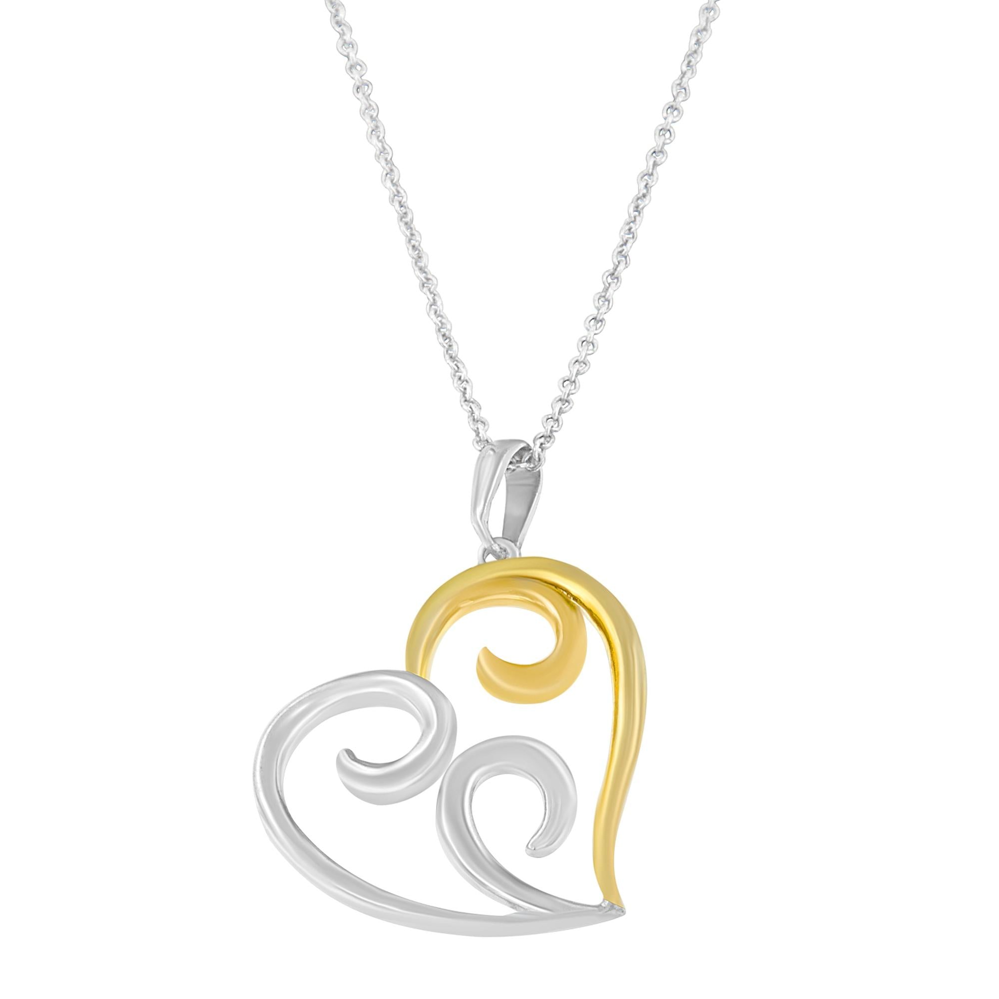 Two-tone wave pendant necklace on a white background