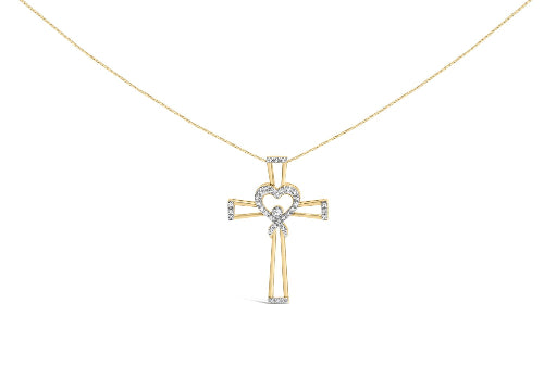 Gold necklace with a cross pendant featuring a heart design on a white background
