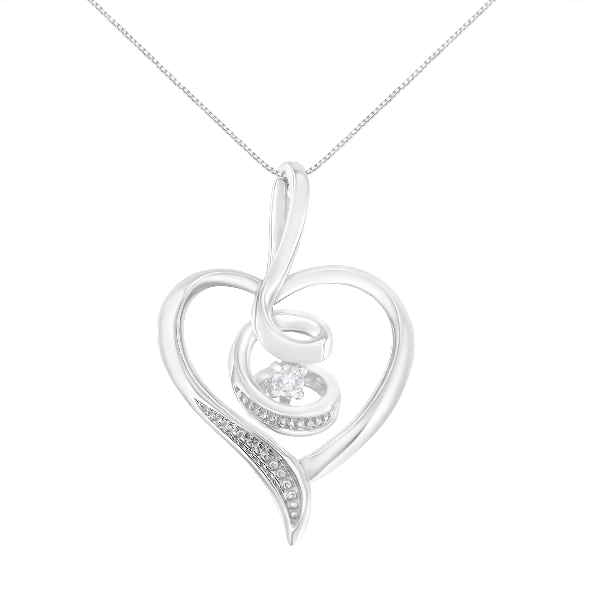Silver heart-shaped pendant with a small round gemstone on a white background