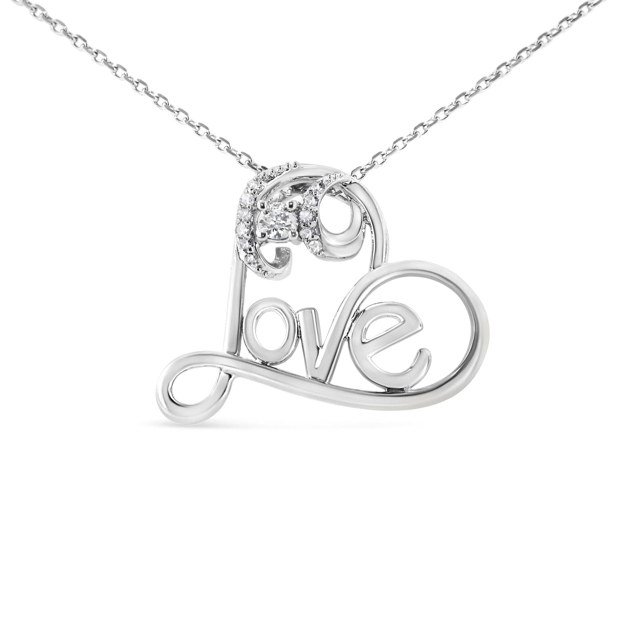 Silver 'love' pendant necklace on a white background