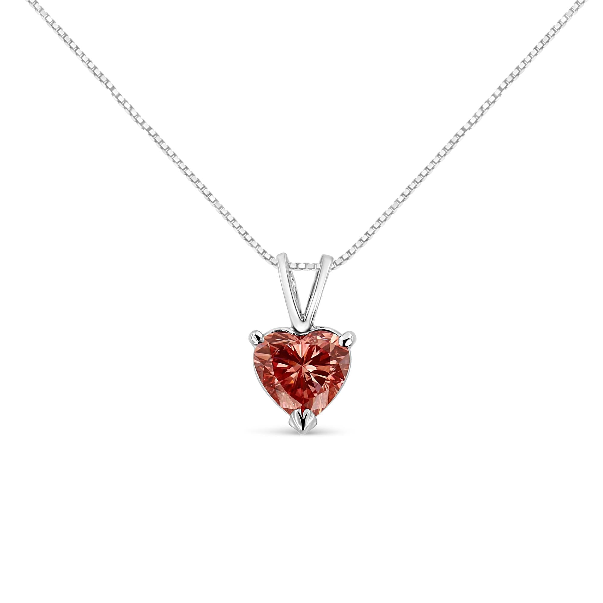 Heart-shaped lab diamond white gold pendant on a white background
