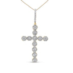 Diamond cross pendant on a white background