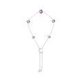 Necklace with pink gemstones and a pearl on a white background