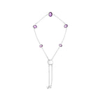 Necklace with pink gemstones and a pearl on a white background