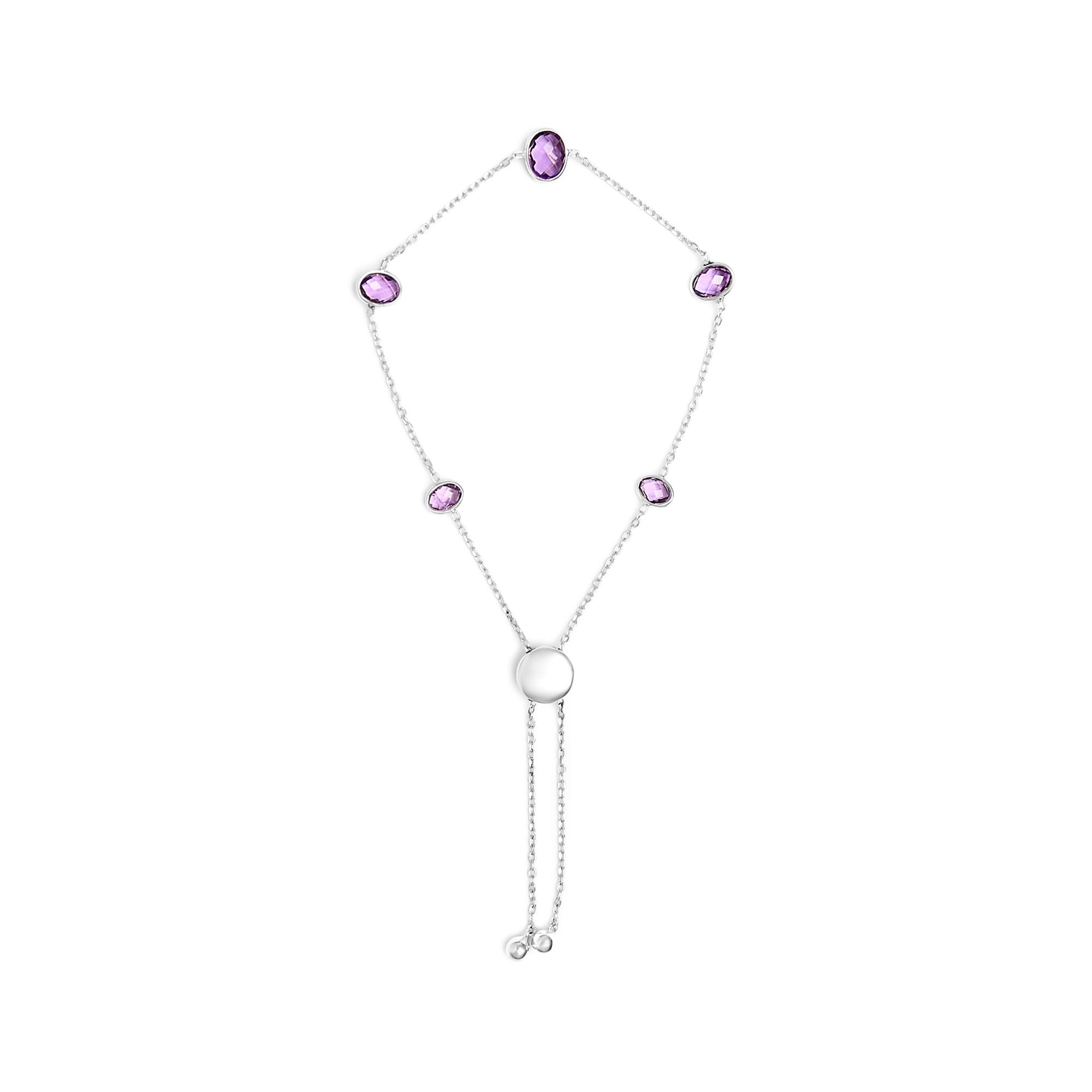Necklace with pink gemstones and a pearl on a white background