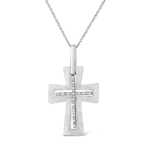 Silver cross pendant necklace on a white background