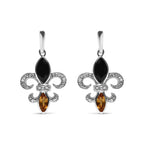 Pair of silver earrings with black and amber stones on a white background