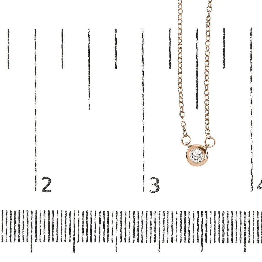 1/5 carat diamond solitaire bezel pendant in 10k rose gold necklace bijoux-nyc direct
