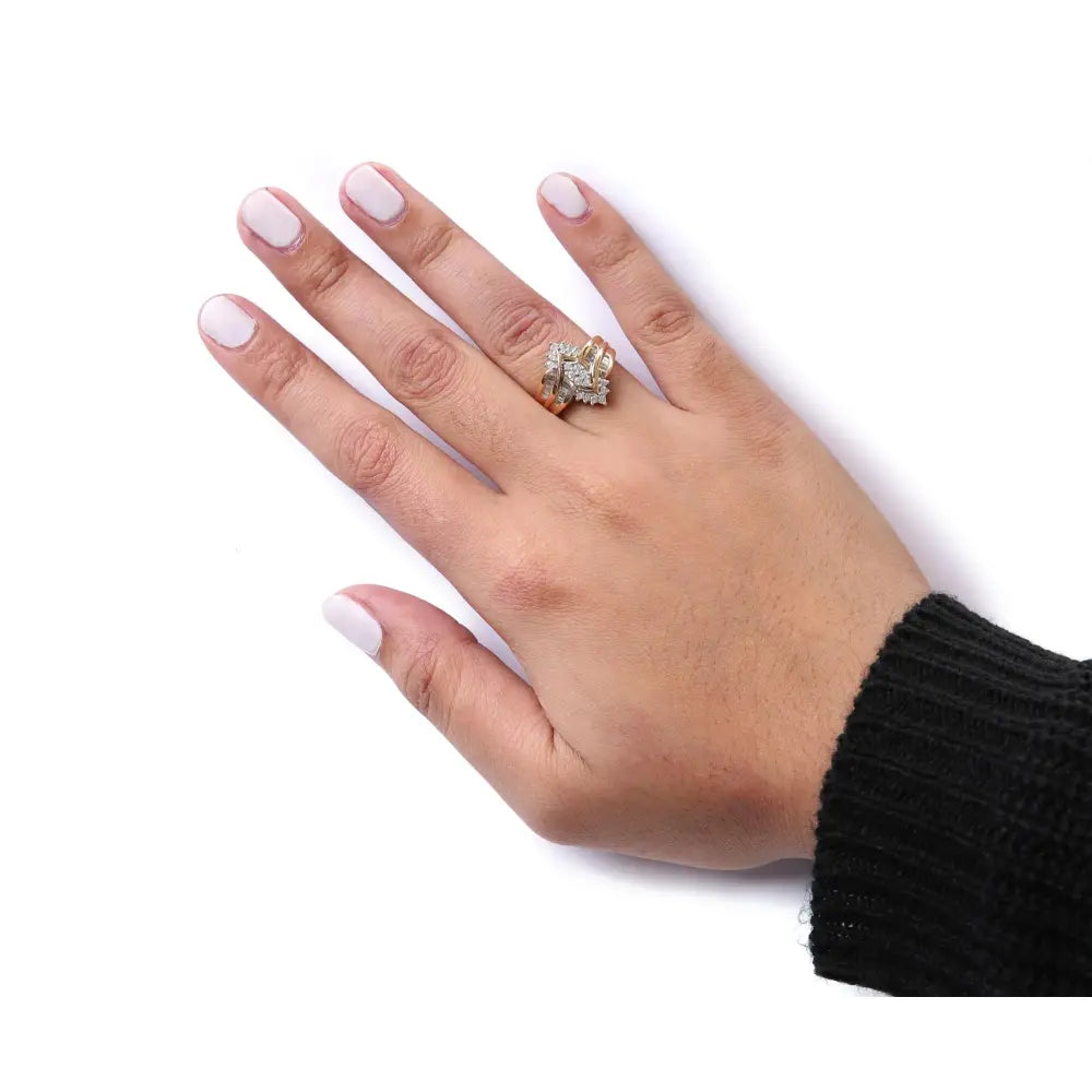 10k two-tone 1/2 cttw pear composite round and baguette diamond ring bijoux-nyc direct