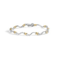 10k two-tone gold 2.00 cttw diamond x and wave link bracelet 7 inches bijoux-nyc direct