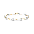 1/3 cttw diamond heart s-link bracelet in 10k two-tone gold 7.25 inch bijoux-nyc direct