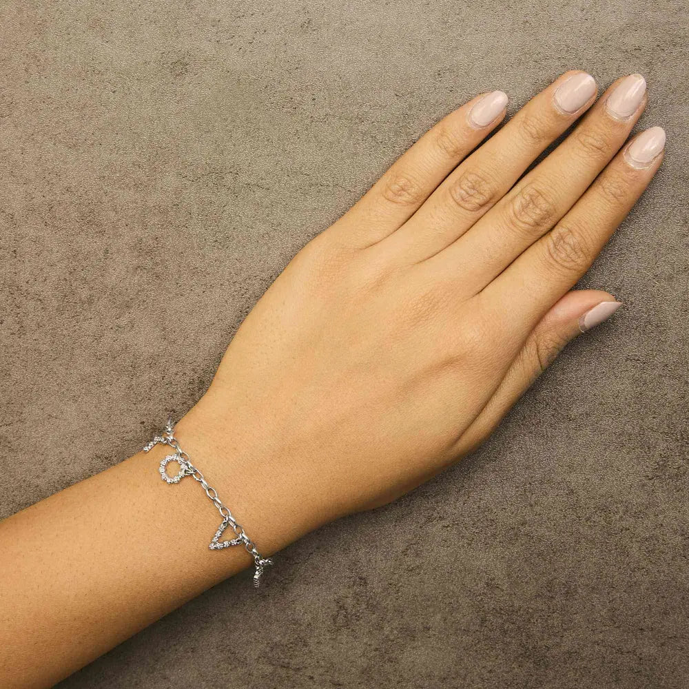10k white gold 1/6 cttw diamond ’love’ charm cable chain bracelet (h i color i1 i2 clarity) 7’’ bracelets/bracelet/charm