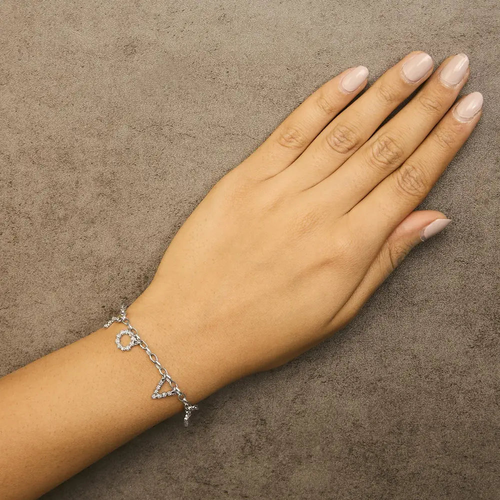 10k white gold 1/6 cttw diamond love charm 7 inch bracelet bijoux-nyc direct