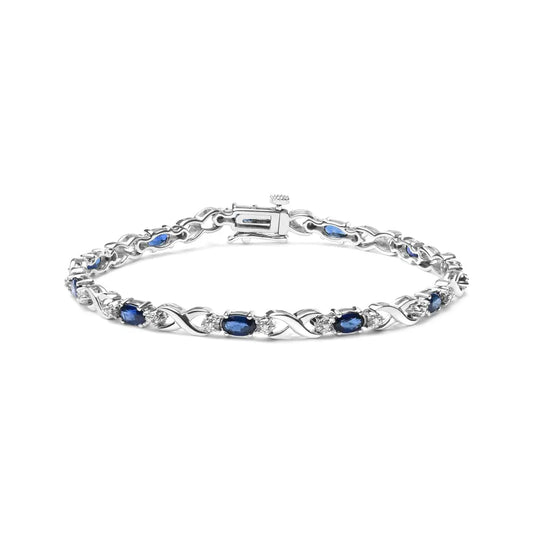 10K White Gold 5x4mm Oval Sapphire Gemstone and 1/10 Cttw Diamond Prong Set "X" Link Bracelet - Size 7" (H-I Color, SI1-SI2 Clarity) - Bijoux-NYC Direct