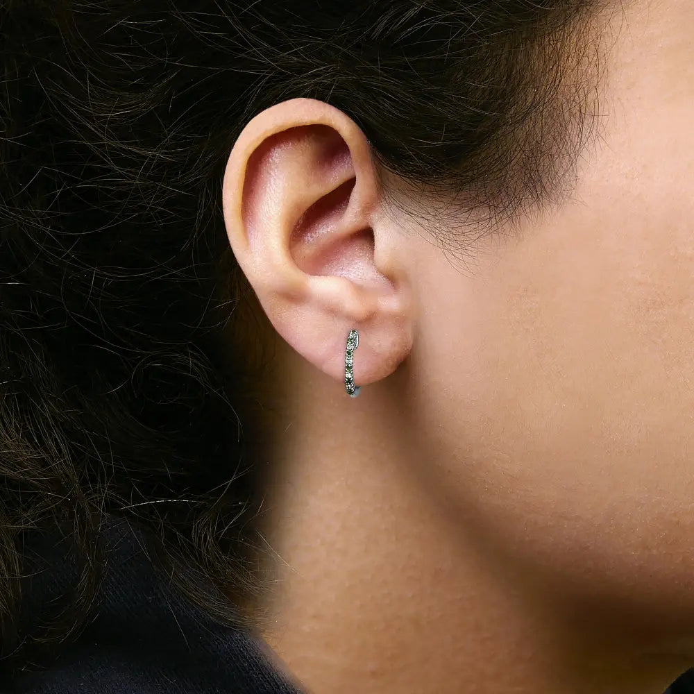 Emerald and diamond huggy hoop earrings in 10k white gold bijoux-nyc direct