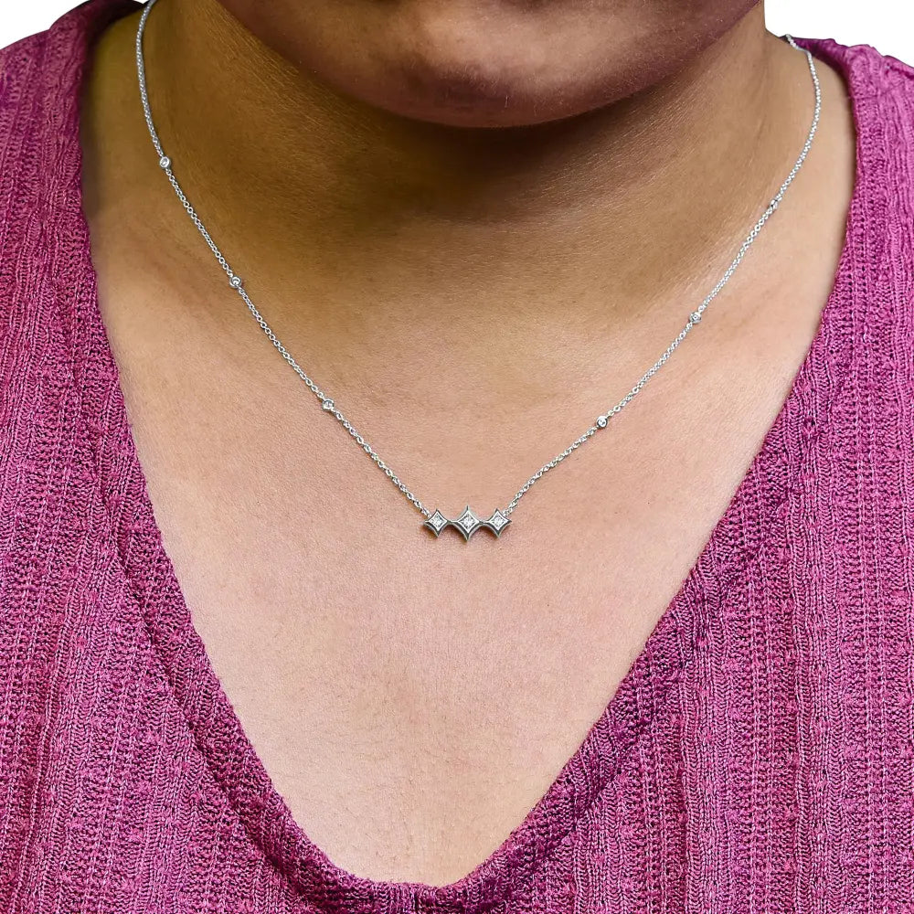 10k white gold bezel set princess diamond 3 stone kite shape and station necklace (h i color si2 i1 clarity) 18’’ inches
