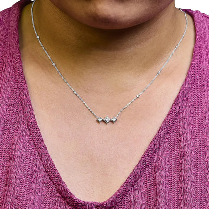 10k white gold bezel set princess diamond 3 stone kite shape and station necklace (h i color si2 i1 clarity) 18’’ inches