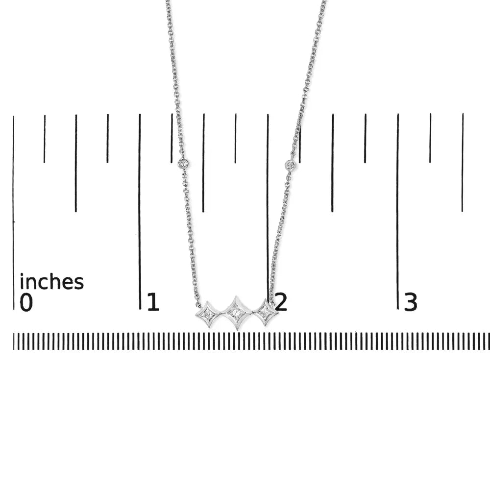 10k white gold bezel set princess diamond 3 stone kite shape and station necklace (h i color si2 i1 clarity) 18’’ inches