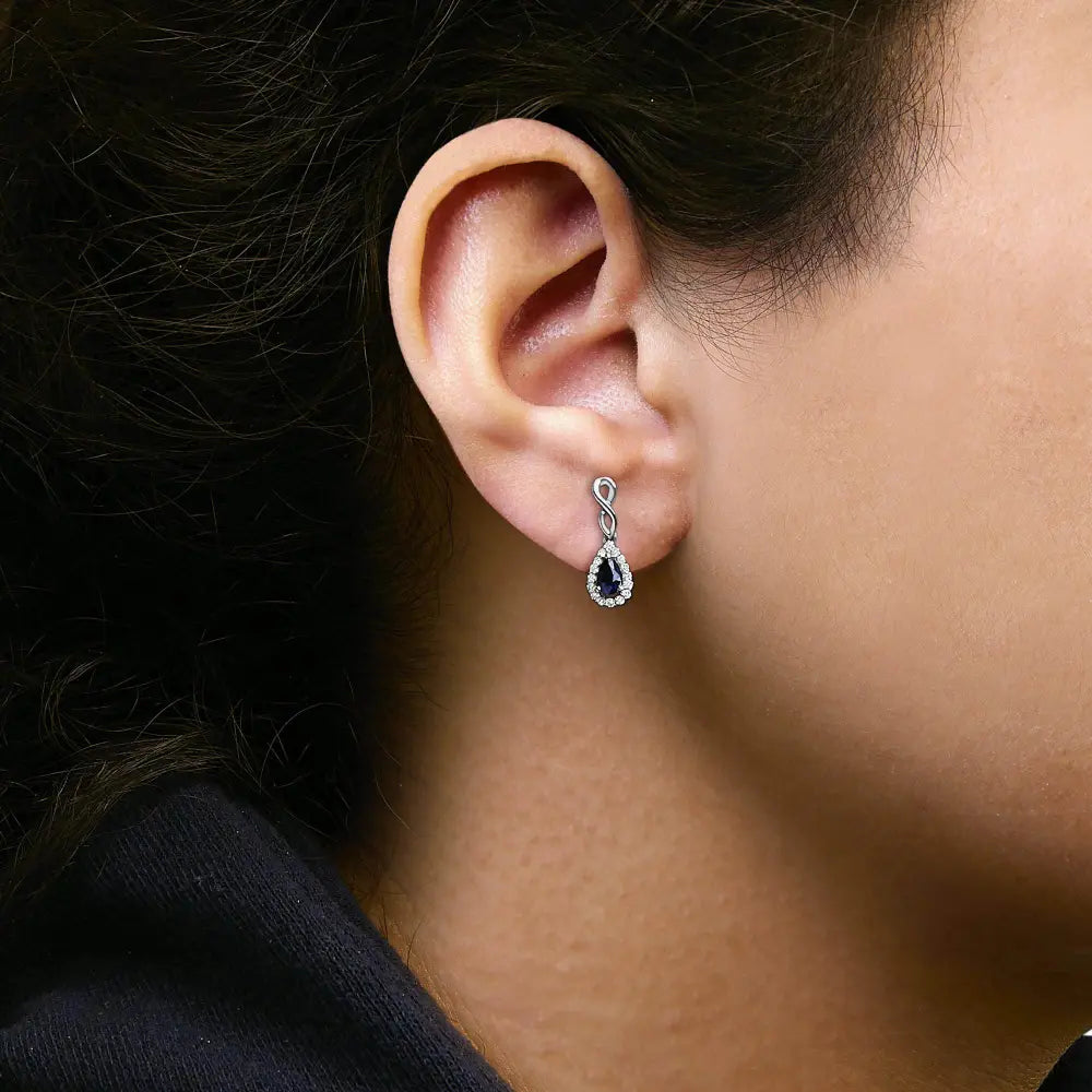 10K White Gold Pear Cut Blue Sapphire and 1/7 Cttw Diamond Infinity Drop and Dangle Earrings (I-J Color, I1-I2 Clarity) - Bijoux-NYC Direct
