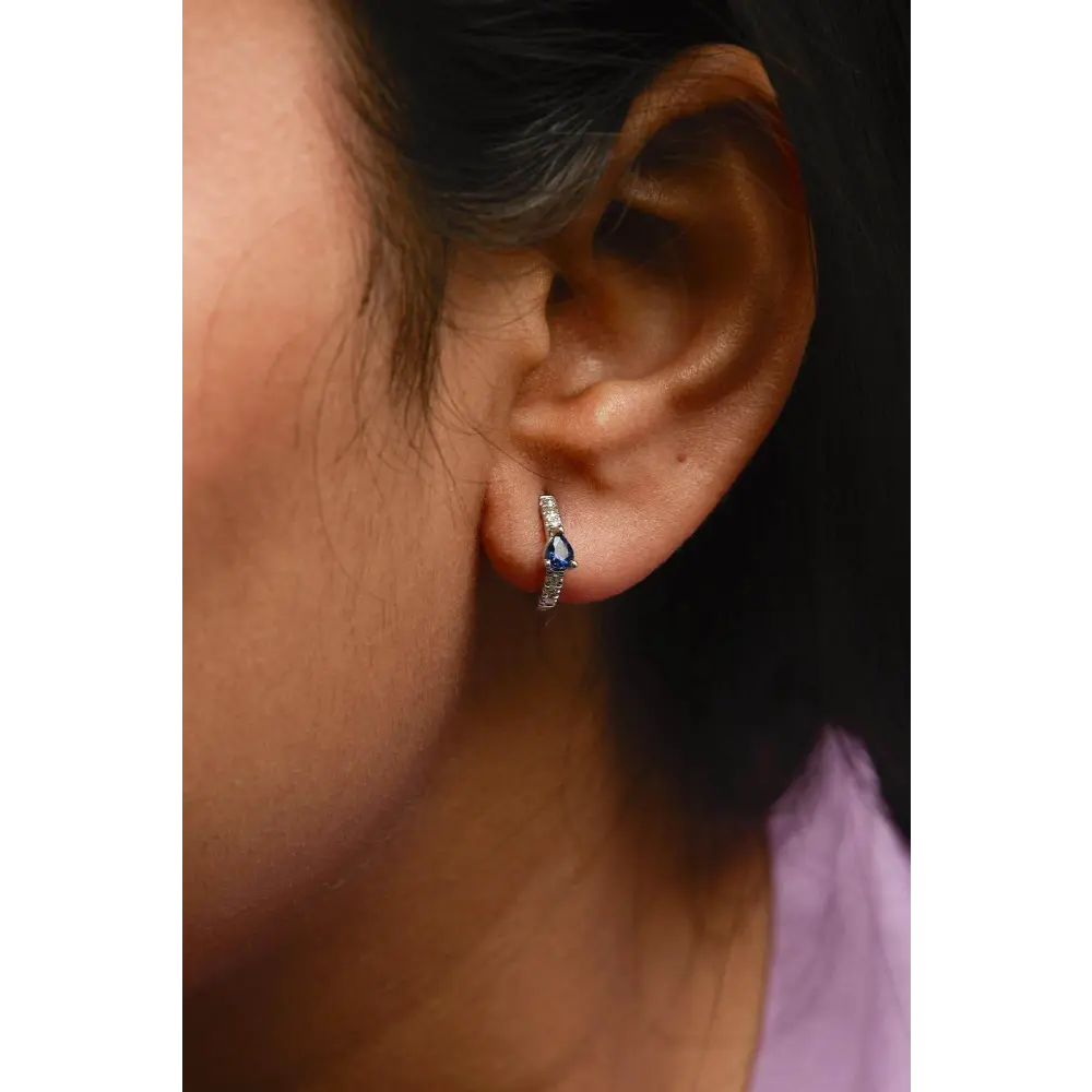 10K White Gold Pear Shaped Blue Sapphire and 1/10 Cttw Diamond Huggy Hoop Earrings (H-I Color, I1-I2 Clarity) - Bijoux-NYC Direct