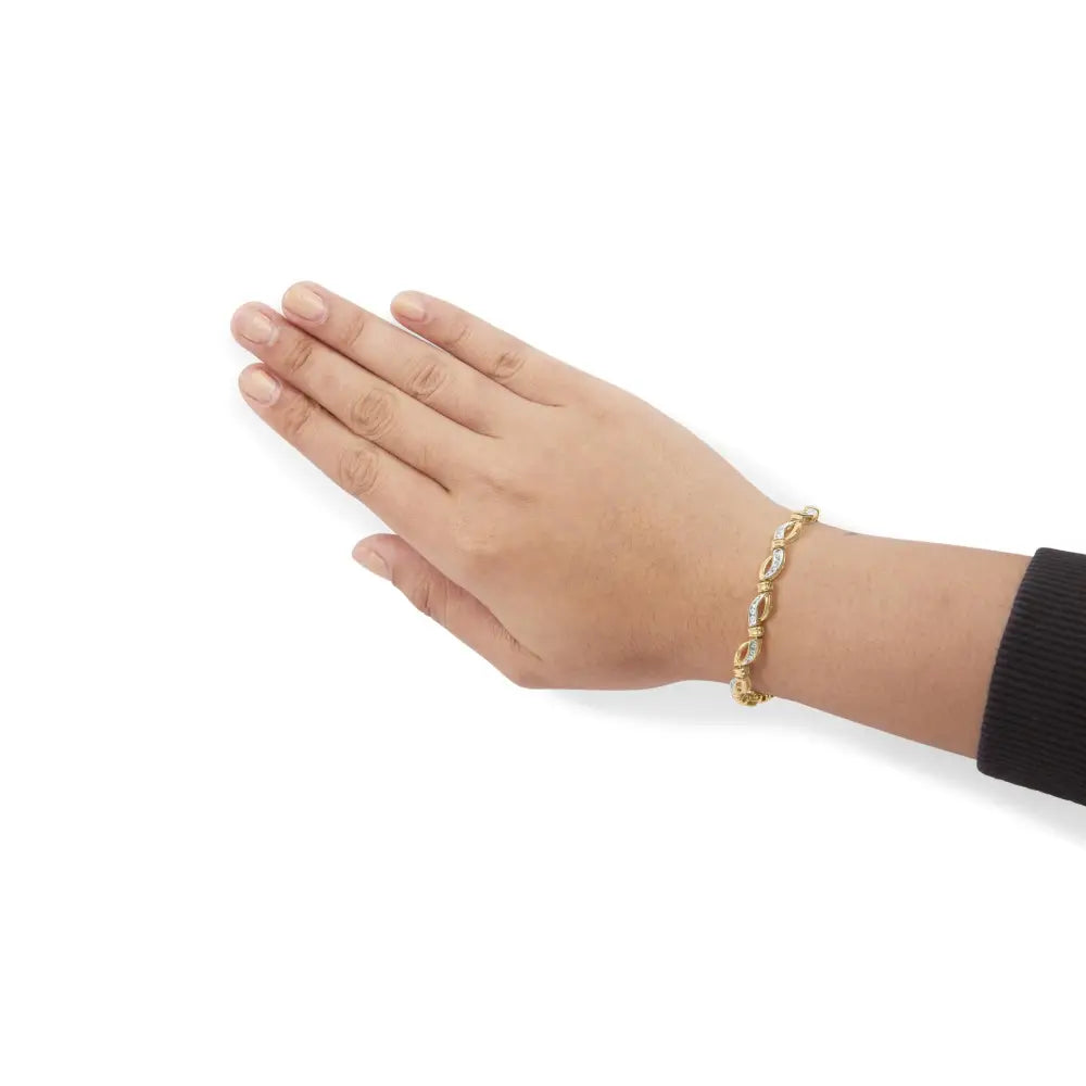 1/2 cttw diamond infinity tennis bracelet in 10k yellow and white gold bijoux-nyc direct