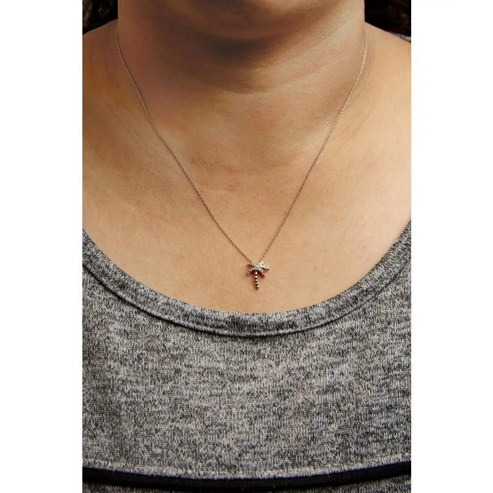 Diamond palm tree pendant necklace in 10k yellow gold – 1/10 ct
