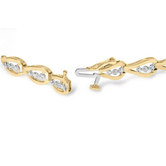 10k yellow gold 1/3 cttw diamond 3 stone teardrop design link bracelet (i j color i1 i2 clarity) 7.25’’ inches